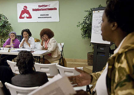 Board of directors of the non-profit Coalition of Neighborhood Councils, Treasurer Elaine Kennedy(left), Chairwoman Barbara Howard, and Vice Chairwoman Marry Young, listen to community residents complaints and criticism about how the organization has been handling its agenda and finances.      