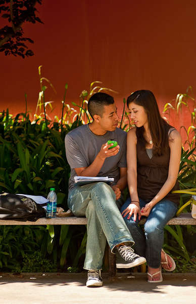 Two students in a quiet moment together. 