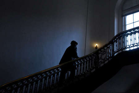 A man walks up the steps of the U.S. House of Representatives Main Interior Building on Constitution Avenue. 