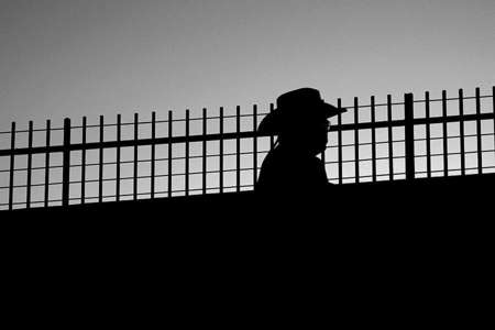 A man passes through the San Diego-Otay Mesa border walkway.