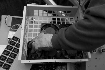 Denise picks up some computer air vents and other tech parts from a near warehouse dumpster. She says computer parts sale better than most other random parts, the more computer items they collect the more likely their recycled value goes up, especially if stripped from all its metal and copper components. 