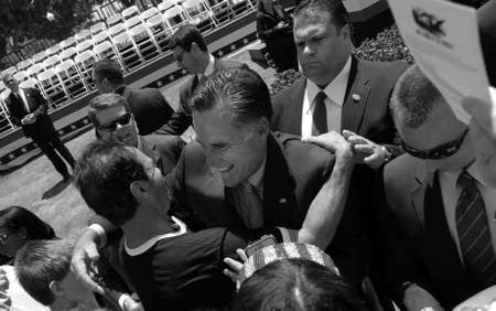 Mitt Romney greeting supporters.