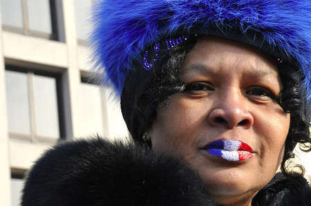 Euretha Henderson, 66, wears the colors of the U.S. flag on her lips to symbolize her patriotism and, what she called "the awaited day" of the first black president of the United States, Barack Obama.